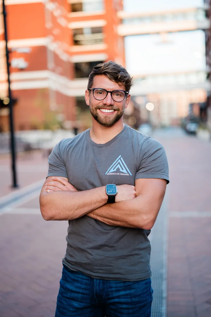 Jimmy LaRowe in an Abundance Life Coaching shirt